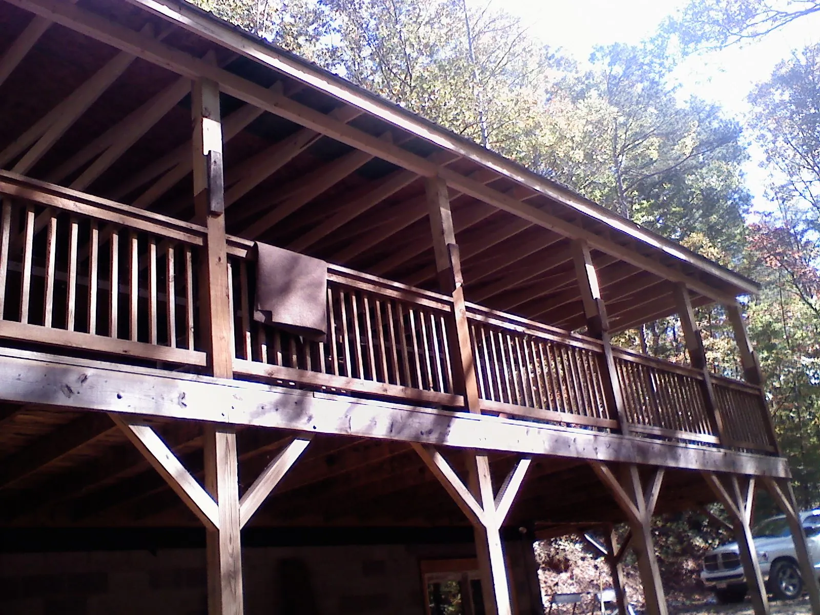 Timber framing under a new elevated porch and deck — Roof Leak Repair in Norton by Roofing Brothers